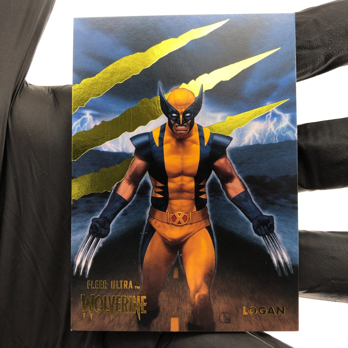 Marvel Card Logan 100 Gold /90 Fleer Upper Deck Ultra Wolverine [NM]