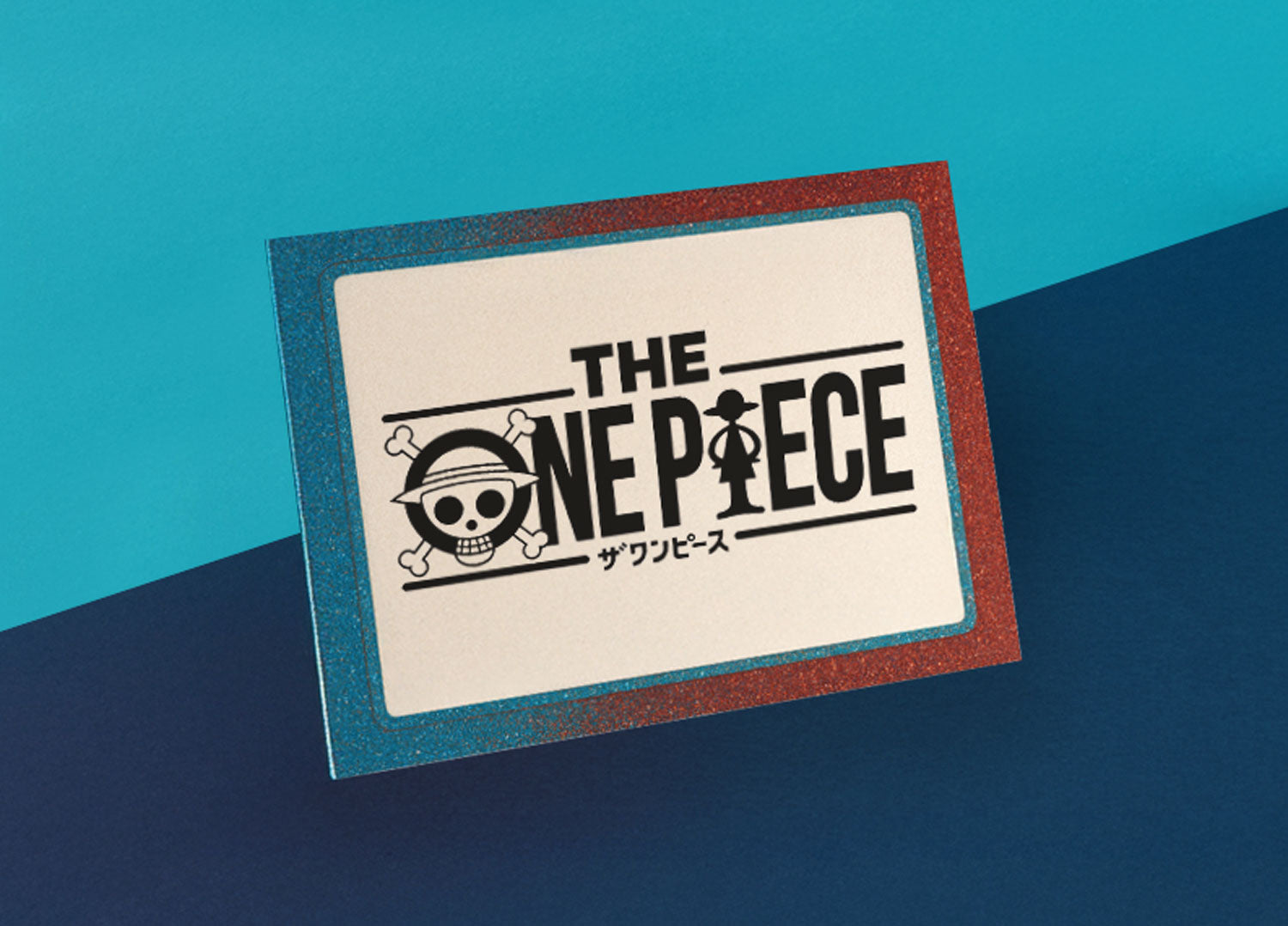 Madgems Ponepiece Sammelkarten. Auf einem Blauen Papierhintergrund steht eine Karte mit Glitzerrand. Sie ist Symbolisch für die Kategorie